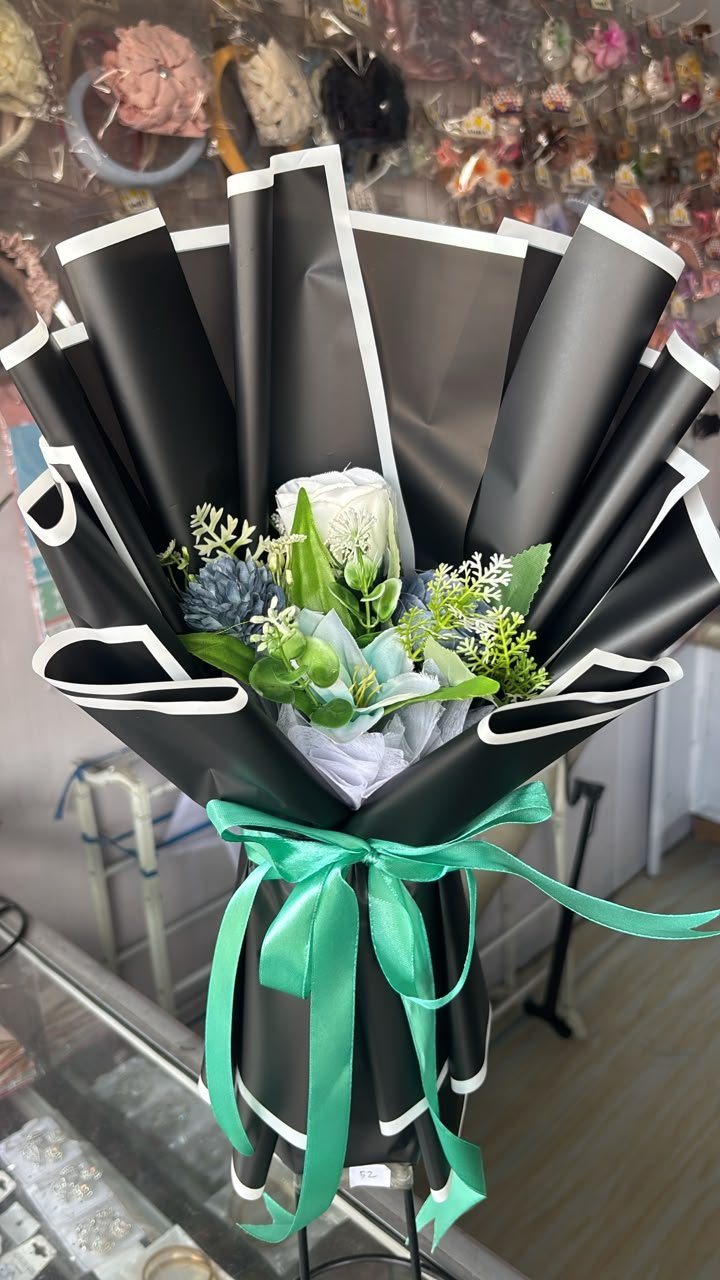 Bucket Boneka Hitam